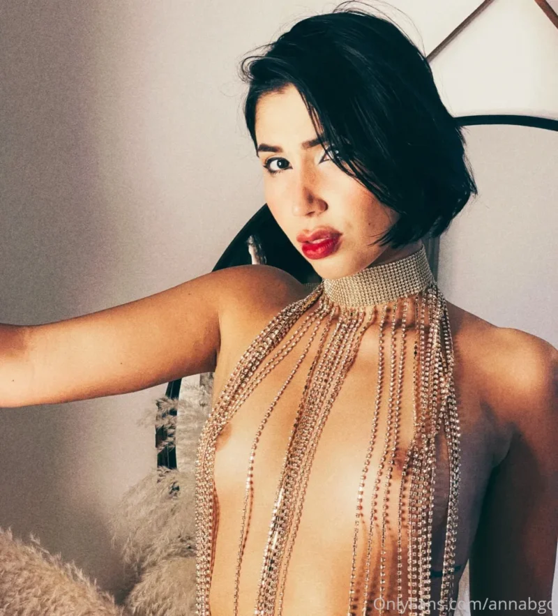 Sultry Anna Beggion in beaded top with bare tits posing for the camera